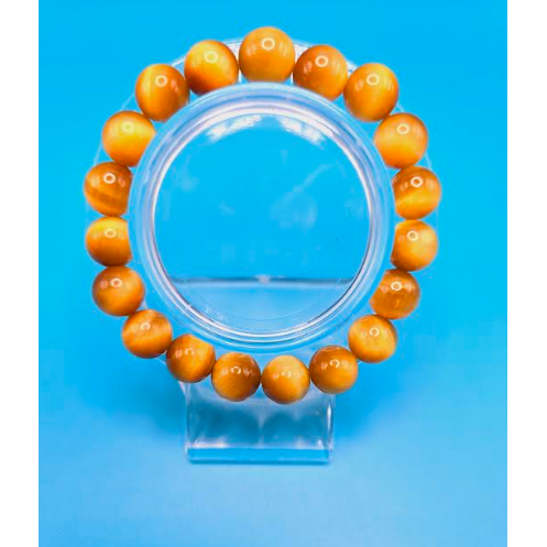 Vibrant color Tiger Eye bead bracelet 9mm. Tiger eye is believed to bring courage, strength and protection to the wearer.